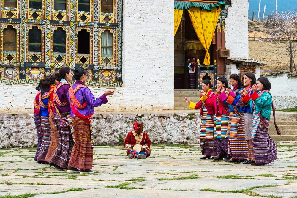 Villagers in traditional dress performing folk song and dance at the Matsutake Festival