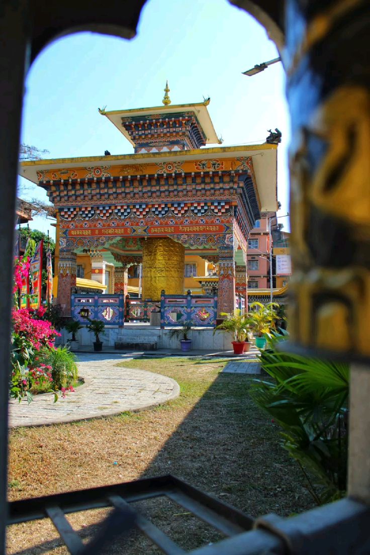 Ornate gate with prayer wheel in Samdrup Jongkhar